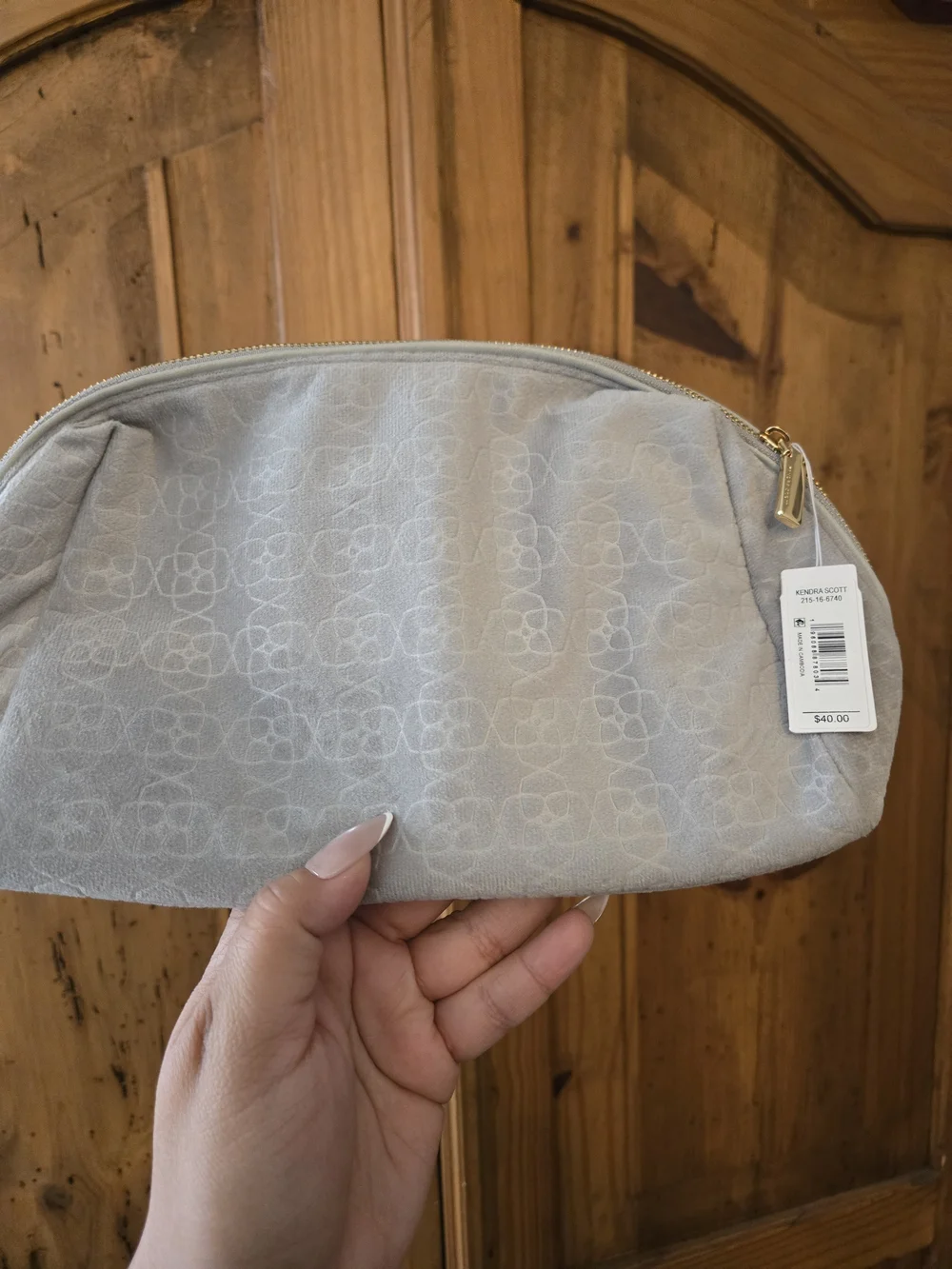 Kendra Scott Light Gray Embossed Logo Cosmetic Pouch with Gold Accent